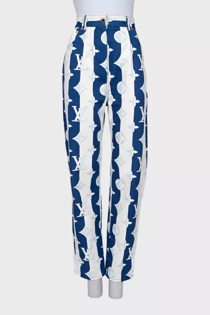 Striped jeans with signature monogram