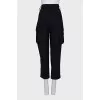 Cropped black trousers with tag