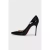 Black patent leather pumps