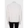 White knitted sweater