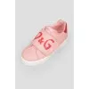 Baby sneakers on a wide Velcro with a tag