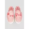Baby sneakers on a wide Velcro with a tag