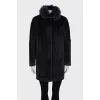 Straight-cut coat with a fur collar