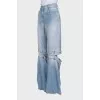 High-waisted wide-leg jeans with holes
