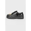 Black sneakers for children with golden beads with tag