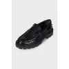 Black leather loafers