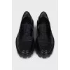 Black leather loafers