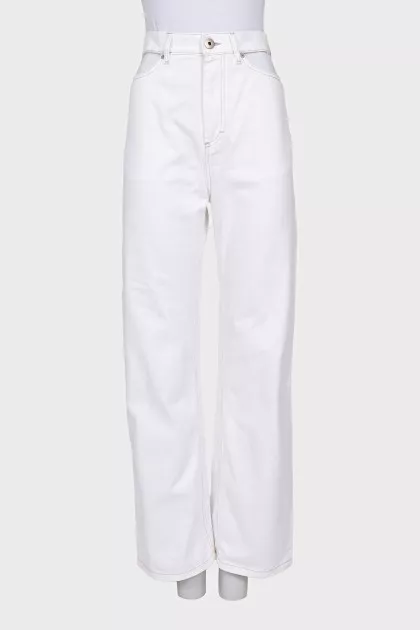 White jeans with cutouts at the waist