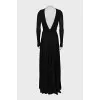 Maxi dress decorated with a necklace