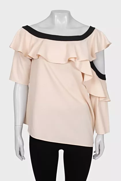 Blouse with asymmetrical sleeves