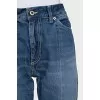 Blue jeans with asymmetrical cut