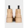 Beige boots with gold decor