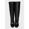 Leather boots with a wide shaft and heels