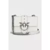White leather bag with brand logo