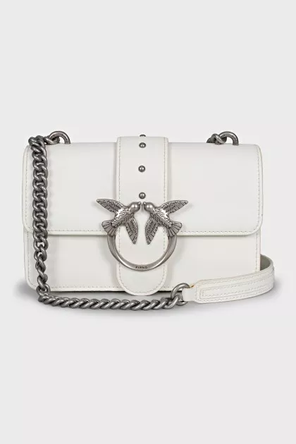 White leather bag with brand logo