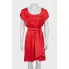 Red silk dress with a wide belt