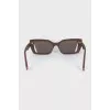 Sunglasses with colored inserts