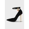 Suede pumps with gold heels