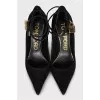 Suede pumps with gold heels