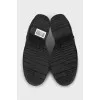 Patent leather shoes with perforations