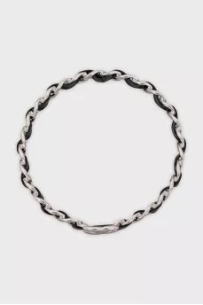 Bracelet made of metal and leather
