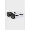 Grand-shaped sunglasses with logo
