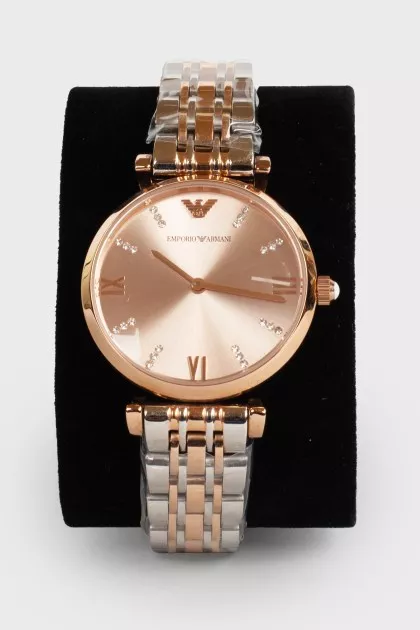 Watch on a bracelet with stones with a tag