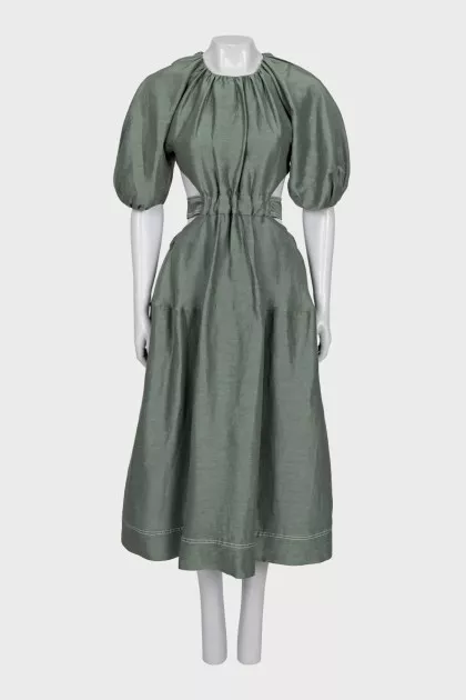 Green dress with a cutout at the waist