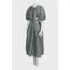 Green dress with a cutout at the waist