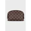 Cosmetic bag with a zipper in a signature print