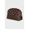 Cosmetic bag with a zipper in a signature print
