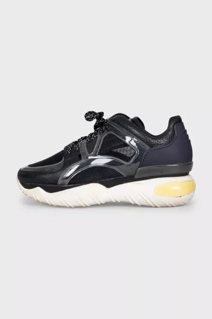 Leather and textile sneakers with a high sole