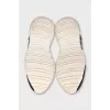 Leather and textile sneakers with a high sole