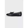 Black leather loafers