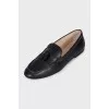 Black leather loafers