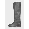 High boots made of gray leather