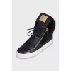Insulated leather sneakers decorated with fur