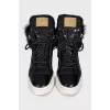 Insulated leather sneakers decorated with fur
