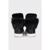 Insulated leather sneakers decorated with fur