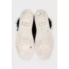 Insulated leather sneakers decorated with fur