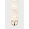 Leather belt with buckle and needle
