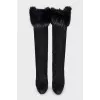 Suede boots decorated with fur