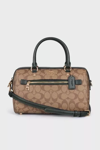 A bag with handles and a strap in a signature print