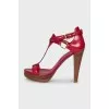 Red wedge-heeled sandals