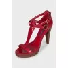 Red wedge-heeled sandals