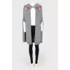 Knitted cape with drawstring hood