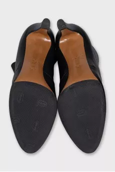 Black leather ankle boots with heels