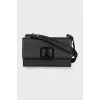 Leather bag with branded logo on the clasp