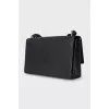 Leather bag with branded logo on the clasp