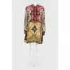 A dress in an abstract print with a hardbred collar
